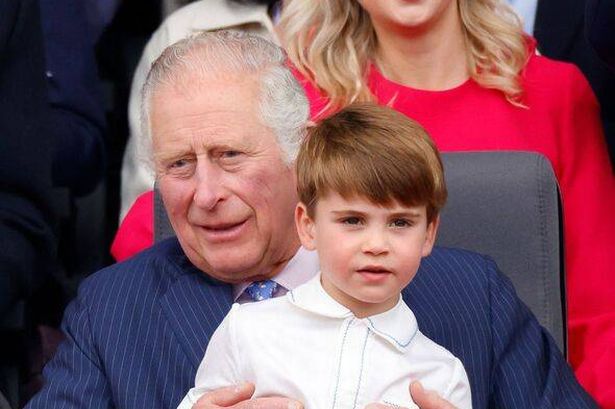 the king pictured with george and louis