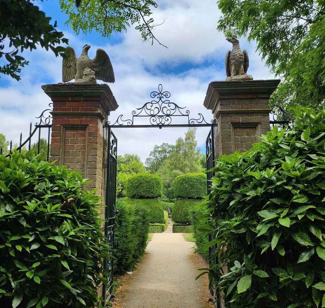 Gardens like these make me feel like Alice in Wonderland. All that's missing are some flamingos to play croquet with.
