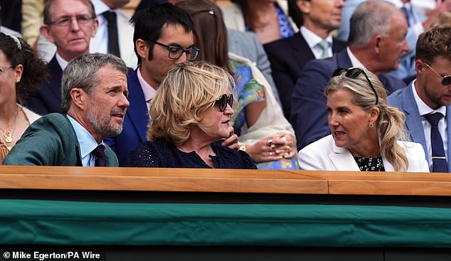 Frederik looked to be enjoying the action on the court as he chatted with others in the royal box today