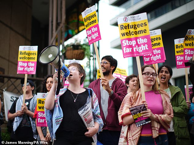Stand Up To Racism protesters near the Britannia International Hotel today