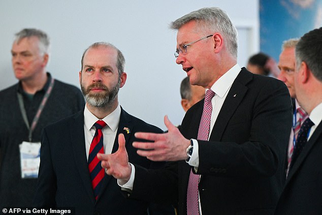 BAE Systems CEO Charles Woodburn (right), with Business, Energy and Industrial Strategy Secretary Jonathan Reynolds