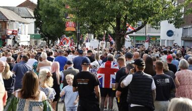 An Epping-style protest to stop migrants being housed above a town's high street shops is underway - as thousands of locals warn of 'mayhem' if the plans go ahead