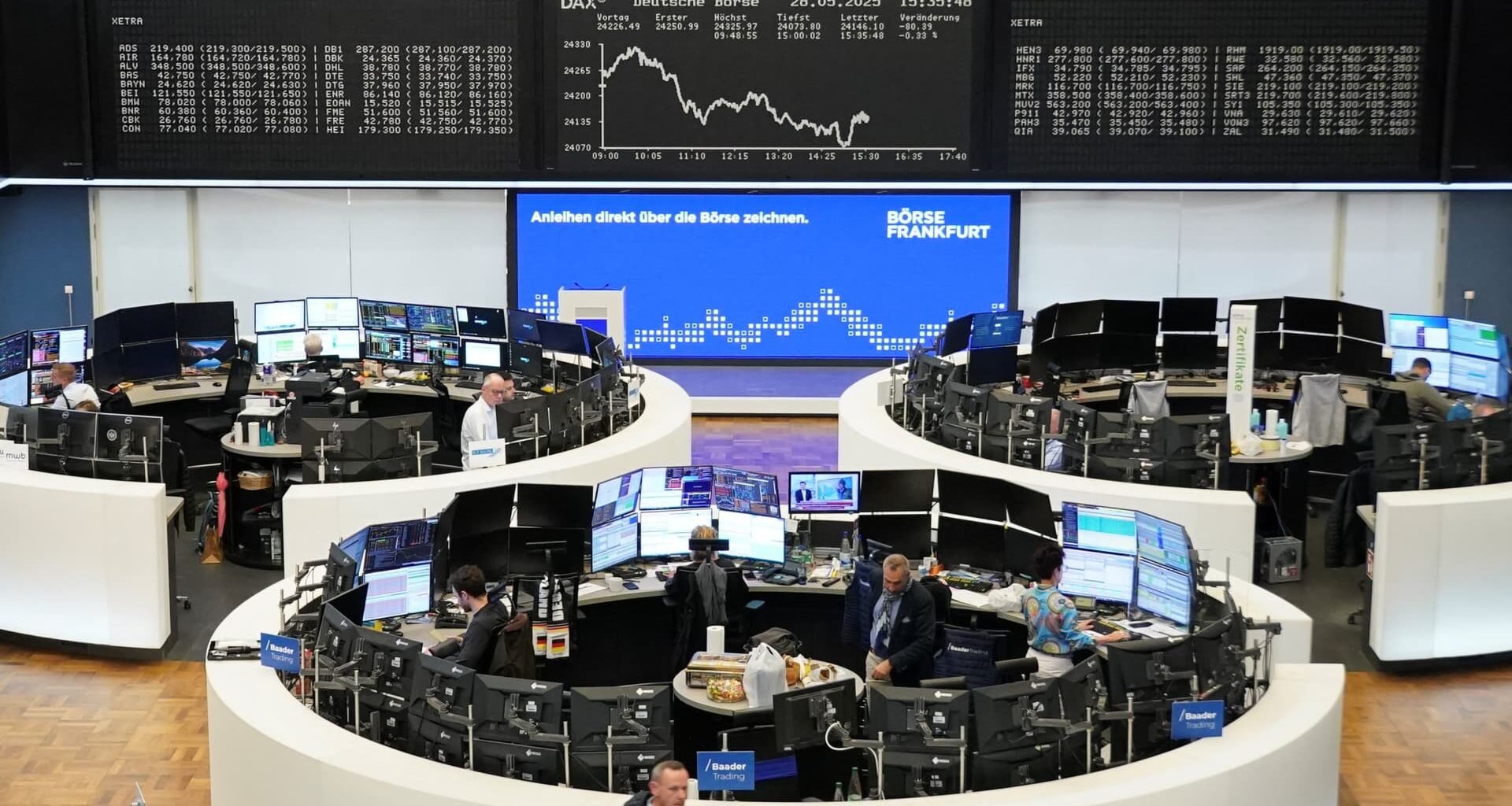 European shares close lower despite earnings beats