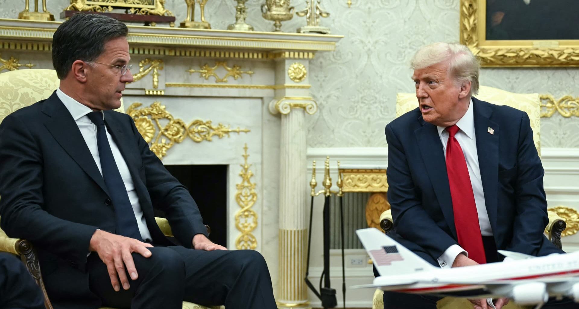 Trump brandishes tariffs for peace, not a trade war