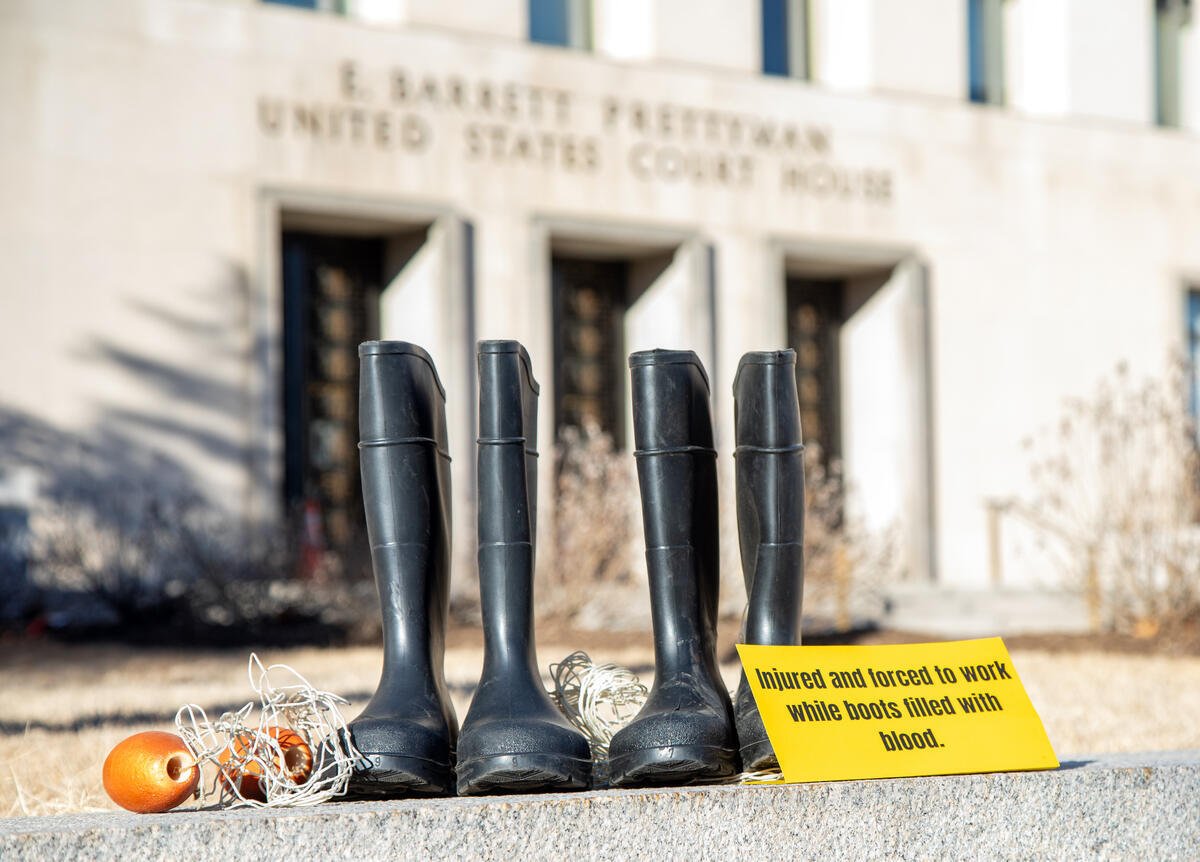 Photo Op "Boots to Boost Justice" in Washington DC. © Tim Aubry / Greenpeace