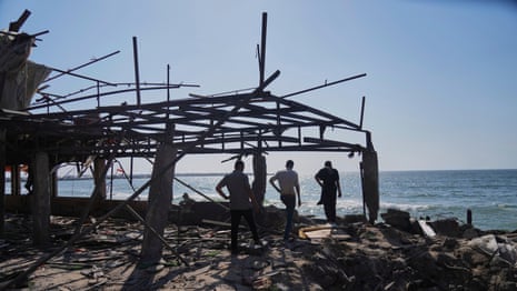 Israeli airstrike on popular Gaza beachside cafe leaves at least 30 dead – video report