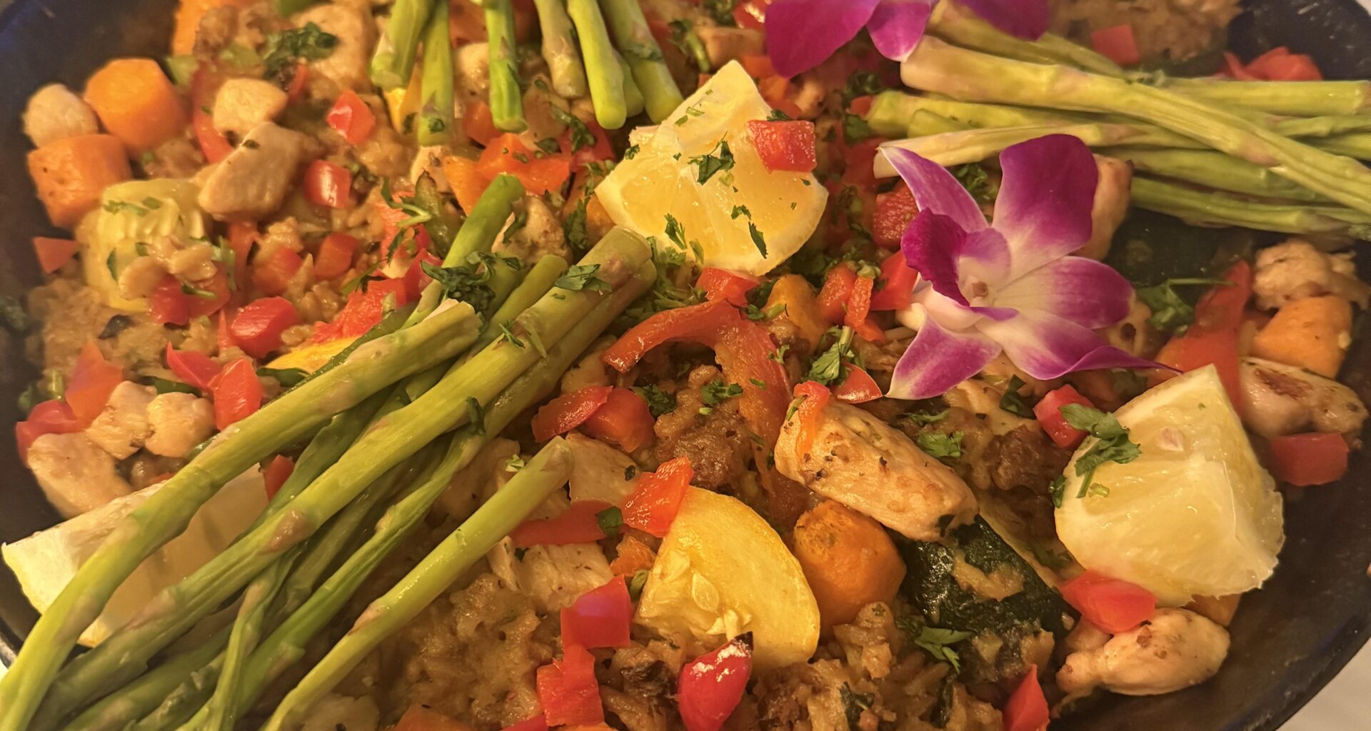 The most egregious abomination of a “paella” I’ve ever seen. Arroz con demasiadas cosas.
