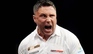 Gerwyn Price celebrates in his match against Luke Littler during the BetMGM Premier League Play-Offs at The O2, London