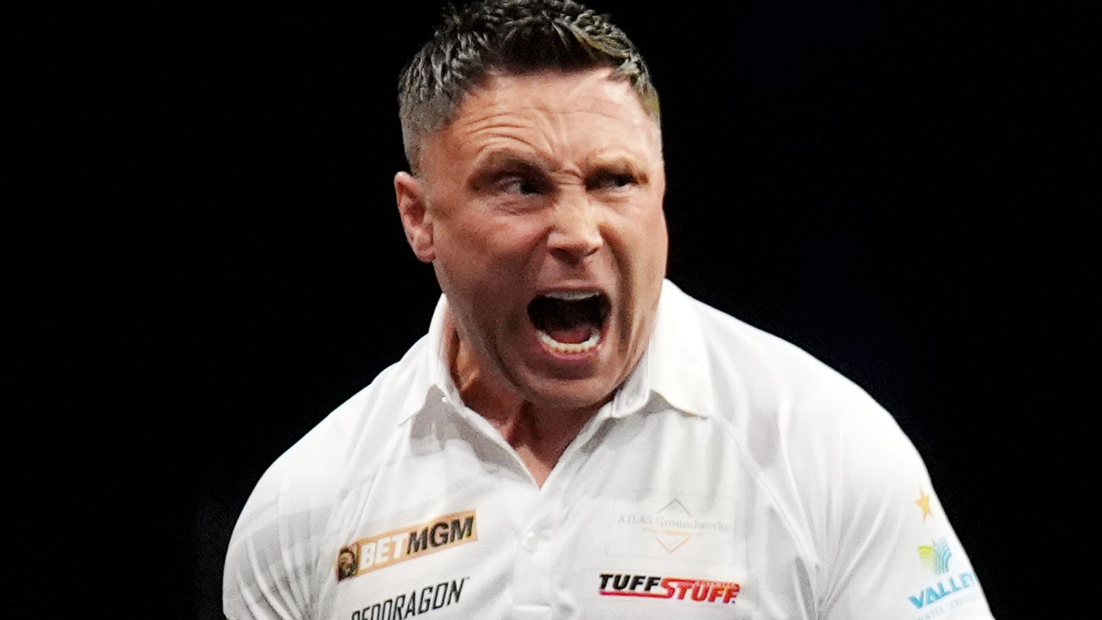 Gerwyn Price celebrates in his match against Luke Littler during the BetMGM Premier League Play-Offs at The O2, London
