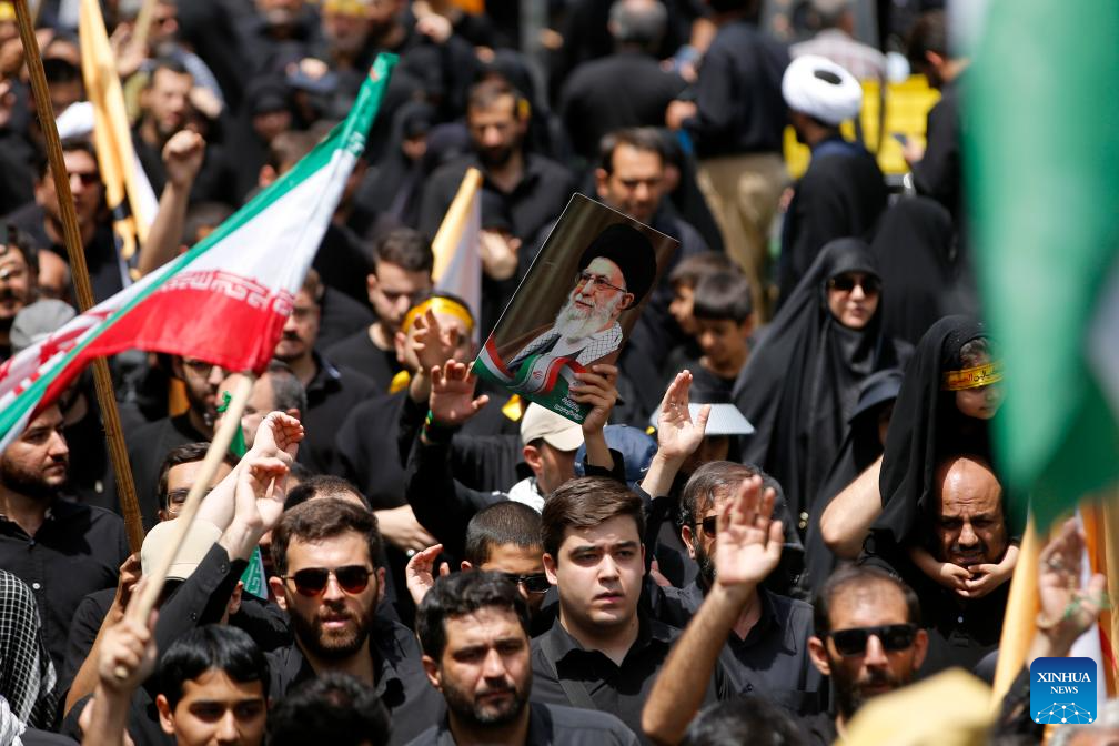 People attend rally in support of Iran's supreme leader in Tehran-Xinhua