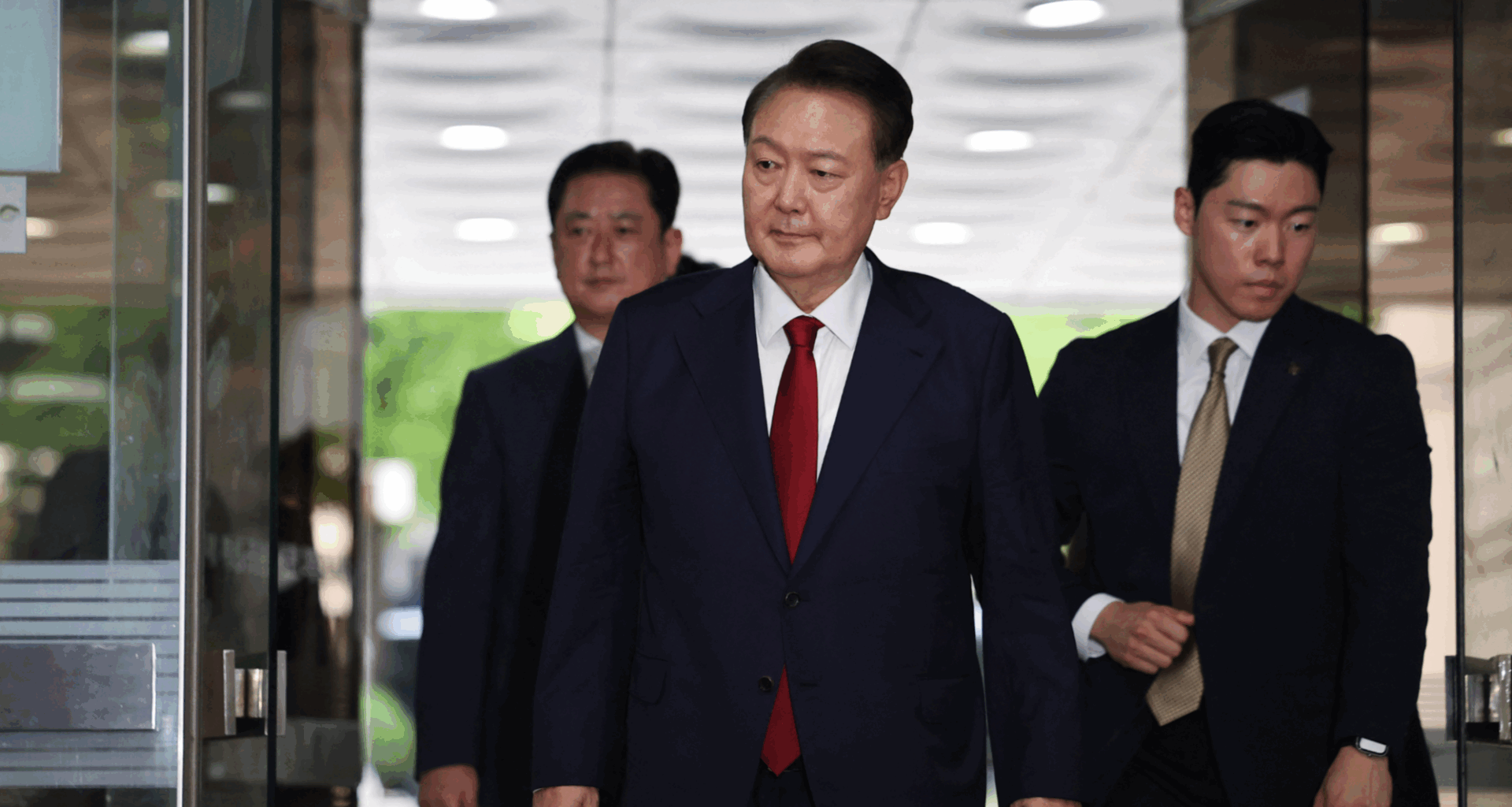 South Korea's former President Yoon attends hearing on detention warrant