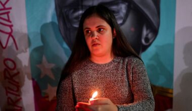 Paola Paiva holds a vigil for brother Arturo Suarez. Pic: Reuters