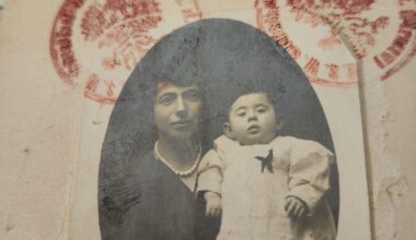 Can someone interpret the passport stamps for clues about the location?