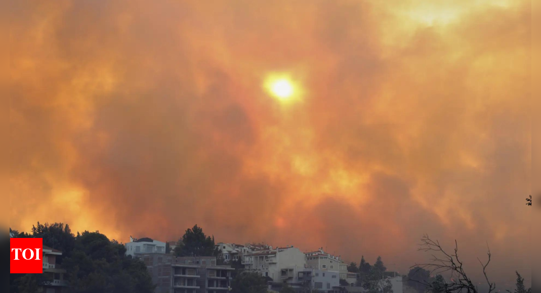 Wildfire burns through northern suburb of Greece's capital Athens and residents are told to evacuate | World News