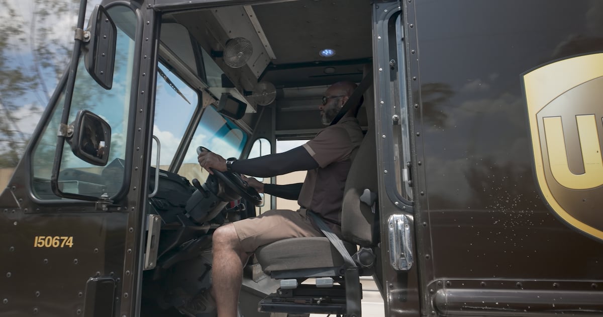 UPS reports declines in quarterly revenue, profit as package volumes reduce