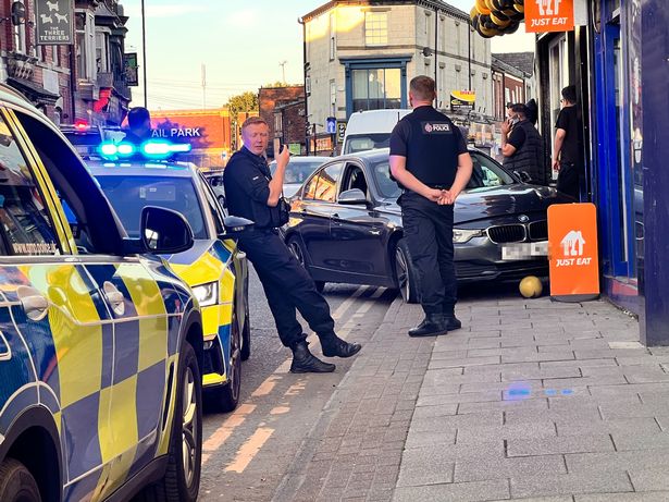 A BMW driver smashed in front of the takeaway 