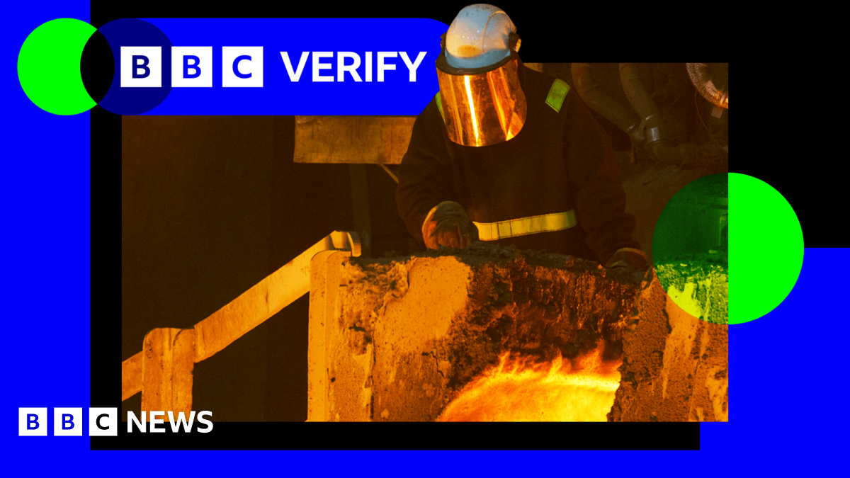 Worker in a steel plant wearing protective headgear and a reflective visor stands behind some molten metal. The BBC Verify branding appears in the top corner.