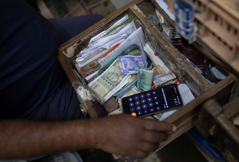Risk boost from US-EU trade deal of little help to rupee as outflows persist