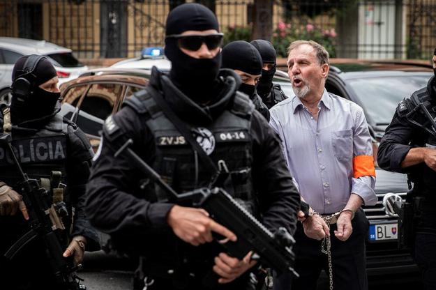 Juraj Cintula arrives at court in Banská Bystrica.