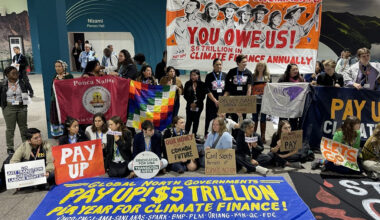 Activists hold a silent protest on Nov. 16 inside the venue of the 2024 United Nations Climate Change Conference (COP29) in Baku, Azerbaijan, to demand that rich nations provide climate finance to developing countries.