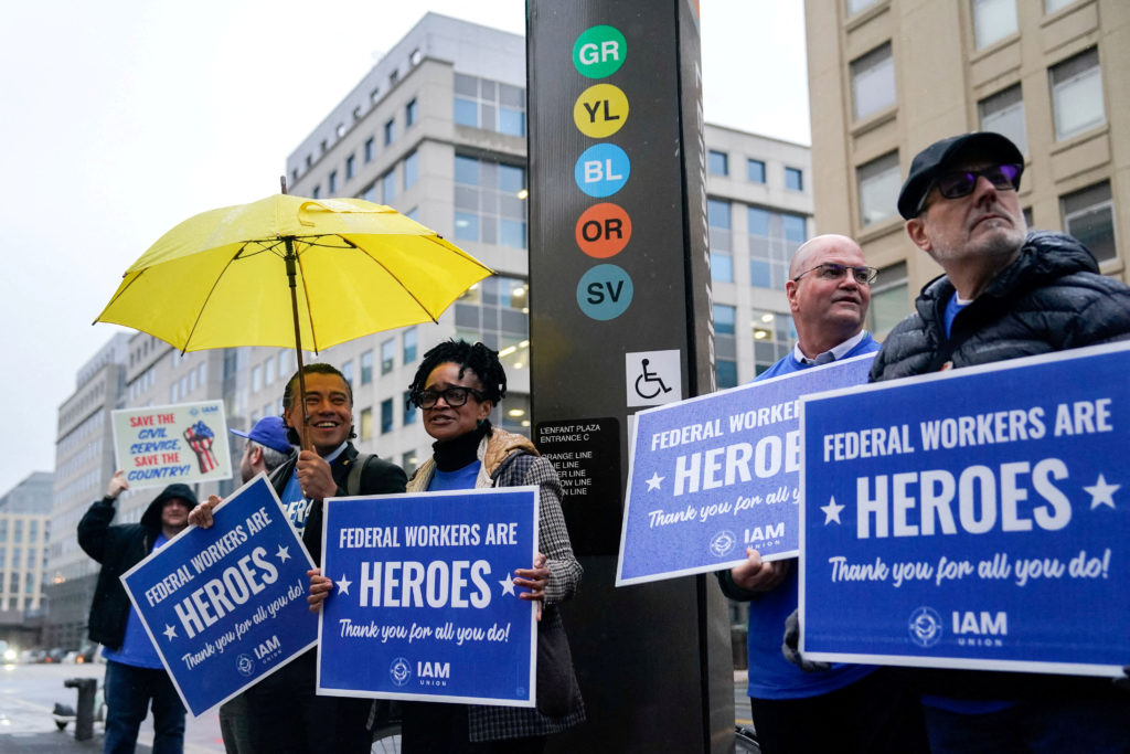FILE PHOTO: Rally in support of federal workers outside the L'Enfant Plaza Metro Station in Washington