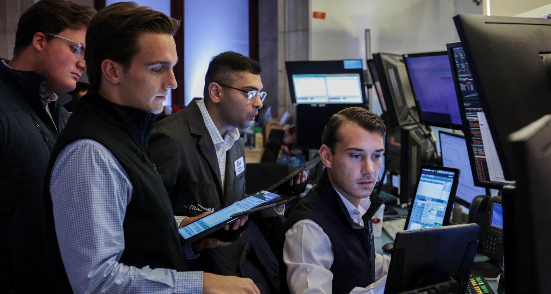 Wall Street edges higher after Trump denies plans to fire Powell
