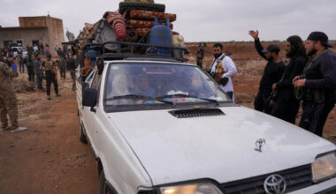 Bedouin families leave the village of Al-Mazraa