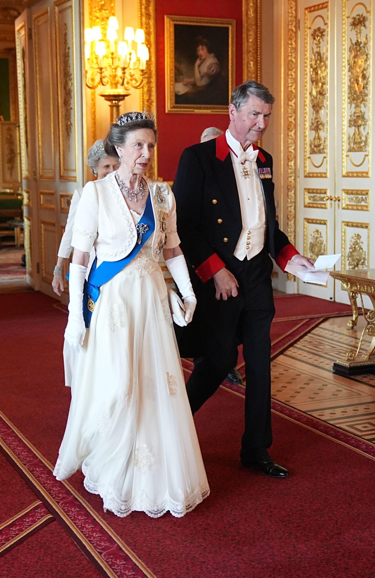 The Princess Royal and Vice Admiral Sir Timothy Laurence attend a state banquet in honor of the President of France at Windsor Castle on July 8, 2025 (Aaron Chown/PA Images/Alamy)