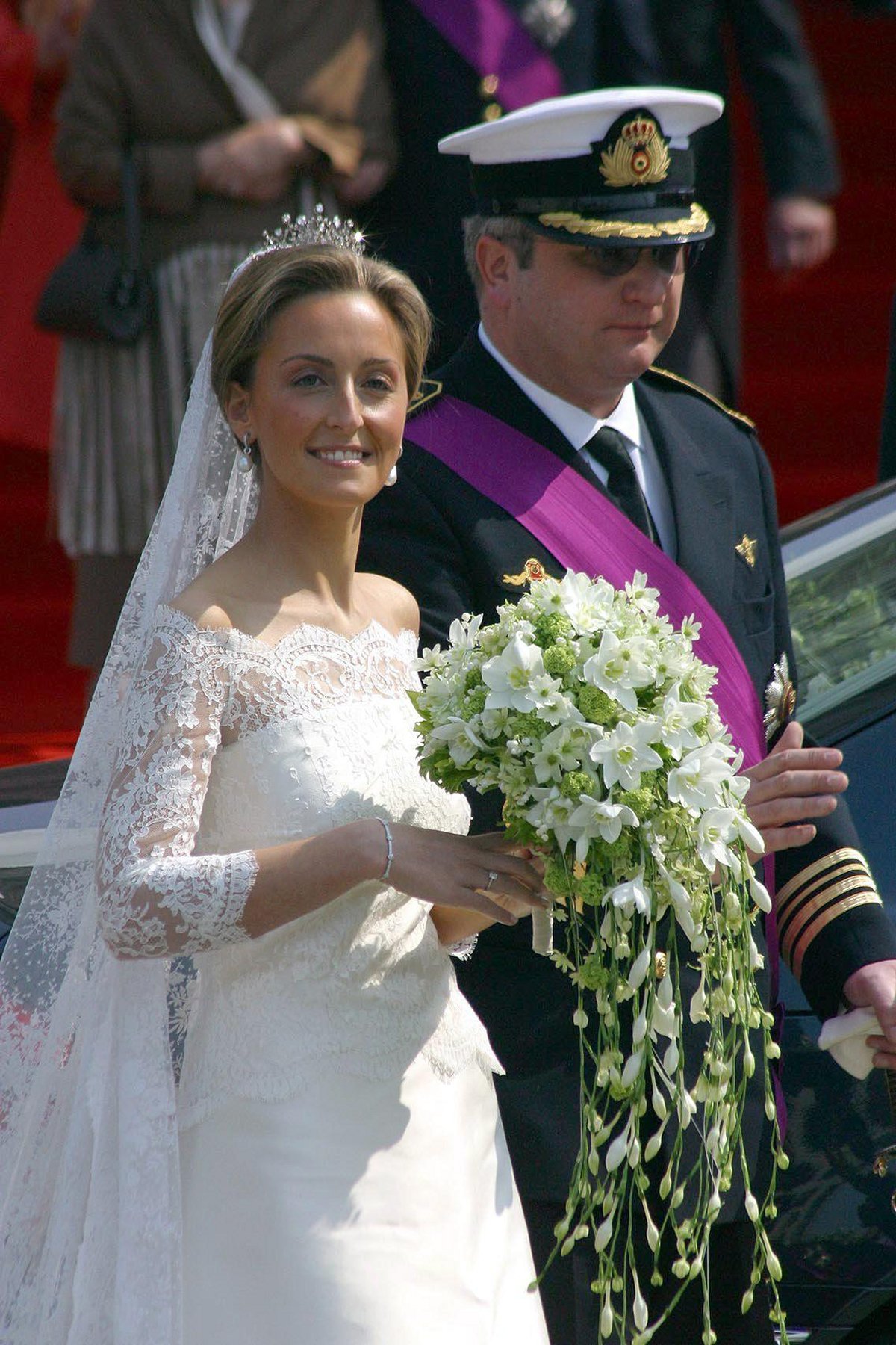 Prince Laurent and Princess Claire of Belgium leave the cathedral in Brussels after their royal wedding on April 12, 2003 (DPA Picture Alliance/Alamy)