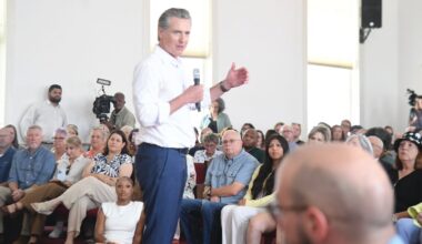 Gavin Newsom addresses a capacity crowd at St. Paul Baptist Church in Laurens on July 9, as part of a whirlwind tour of small South Carolina cities.