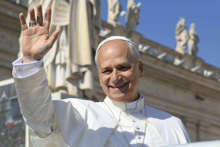 Pope Leo waves during his June 25, 2025, general audience.