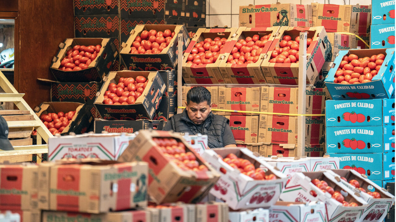 Tomato crates are displayed for sale inside a warehouse at Central de Abasto vegetable market in Mexico City