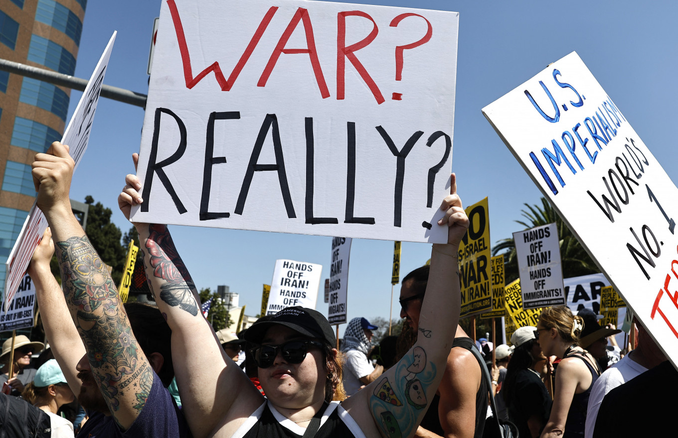 War wary: Demonstrators gather outside the Wilshire Federal Building during a rally opposing the United States' strikes on Iran on June 22 in Los Angeles, California, the United States. The US overnight dropped a series of bombs on several alleged nuclear facilities in Iran, joining Israel's ongoing strikes within the country. Iran responded with a barrage of missiles at Israel and promised retaliation against US interests in the region.