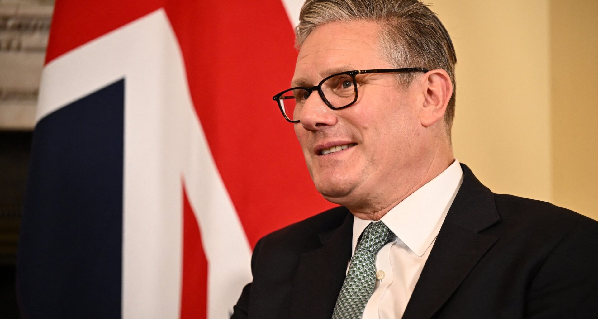 Britain's Prime Minister Keir Starmer smiles during a meeting with Germany's Chancellor Friedrich Merz inside 10 Downing Street in London on July 17, 2025.