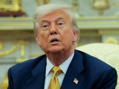 President Donald Trump speaks to reporters during a meeting with Crown Prince of Bahrain Salman bin Hamad Al Khalifa in the Oval Office of the White House on July 16, 2025, in Washington, D.C.
