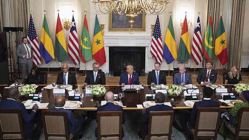 President Donald Trump speaks with African leaders including Senegalese President Bassirou Diomaye Faye, Liberian President Joseph Nyuma Boakai, Bissau-Guinean President Umaro Sissoco Embal€, Mauritanian President Mohamed Ould Ghazouani and Gabonese President Brice Oligui Nguema during a lunch in the State Dining Room of the White House, Wednesday, July 9, 2025, in Washington. (AP Photo/Evan Vucci)