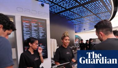 Cybertruck boxes and tacos: Elon Musk opens ‘retro futuristic’ Tesla Diner in LA | US news