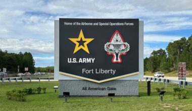 Vehicles pass a sign for Fort Liberty, an Army installation near Fayetteville, N.C., in 2024. The name was changed from Fort Bragg in 2023, but Defense Secretary Pete Hegseth signed an order in February changing it back, purportedly in honor of World War II veteran Roland L. Bragg of Maine. But since it was originally named for Confederate Gen. Braxton Bragg, Paul L. Newman writes that the renaming is a feint.