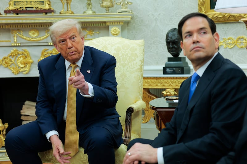 WASHINGTON, DC - JULY 16: U.S. President Donald Trump (L) speaks to reporters as U.S. Secretary of State Marco Rubio looks on during a meeting with Crown Prince of Bahrain Salman bin Hamad Al Khalifa in the Oval Office of the White House on July 16, 2025, in Washington, D.C. Trump is scheduled to hold a bilateral meeting and working lunch with the Crown Prince during the visit. (Photo by Anna Moneymaker/Getty Images)