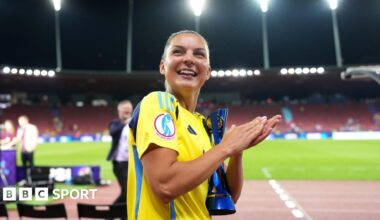 Sweden celebrate with supporter