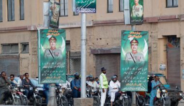 Posters of Pakistan’s army chief, Field Marshal Asim Munir, in Karachi, Pakistan, in on May 25.