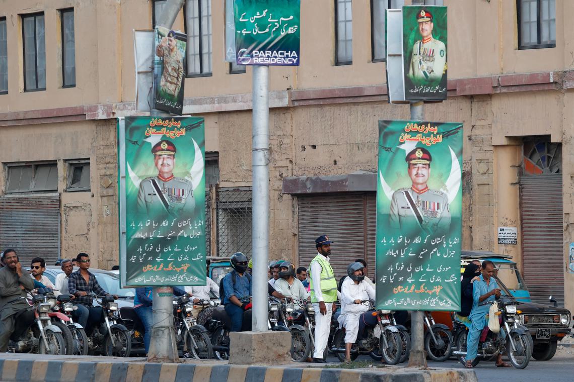 Posters of Pakistan’s army chief, Field Marshal Asim Munir, in Karachi, Pakistan, in on May 25.