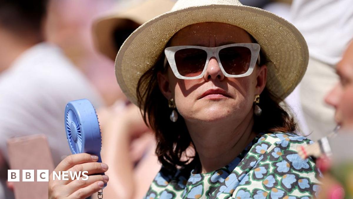Heatwave pushes UK temperatures to 34.7C as millions face hosepipe bans