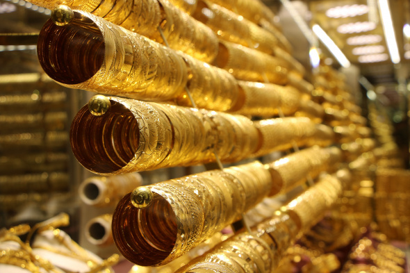File photo shows gold bracelets displayed in a showcase at Turkish jewelry store in Türkiye's Istanbul. (IHA Photo)