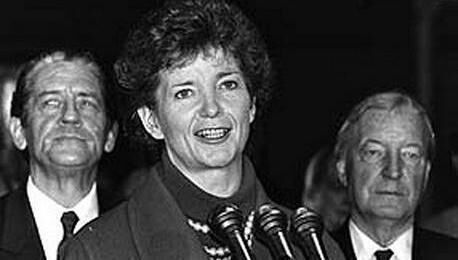President Mary Robinson with a clearly unhappy Charles Haughey and a disappointed Brian Lenihan in the backgournd.