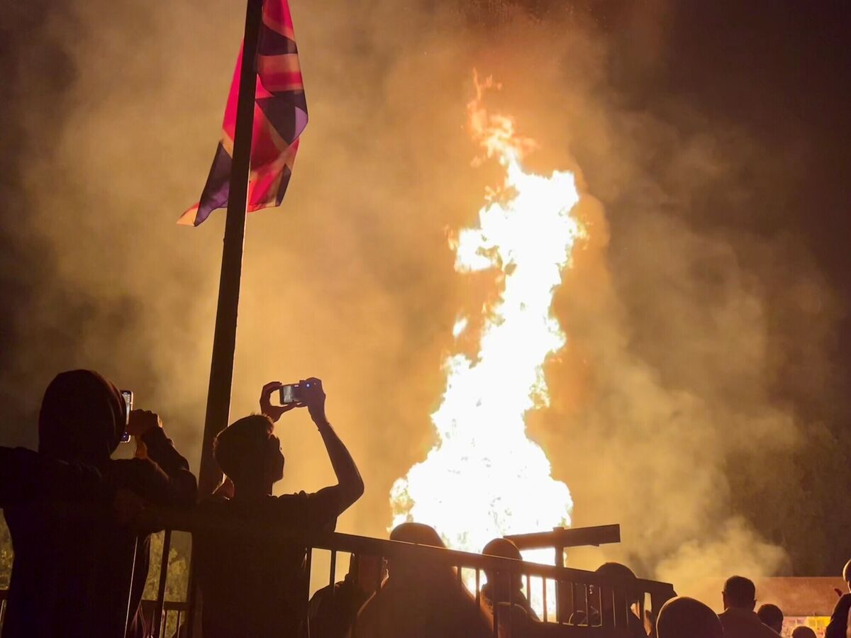 An Eleventh Night bonfire in Orangefield Park in east Belfast. Some of the largest structures stand more than 30 feet tall and are constructed from tens of thousands of wooden pallets, along with tyres, plastics, furniture, and household waste. These materials, when set alight, release a potent and dangerous cocktail of pollutants into the air. An Eleventh Night bonfire in Orangefield Park in east Belfast. Some of the largest structures stand more than 30 feet tall and are constructed from tens of thousands of wooden pallets, along with tyres, plastics, furniture, and household waste. These materials, when set alight, release a potent and dangerous cocktail of pollutants into the air.