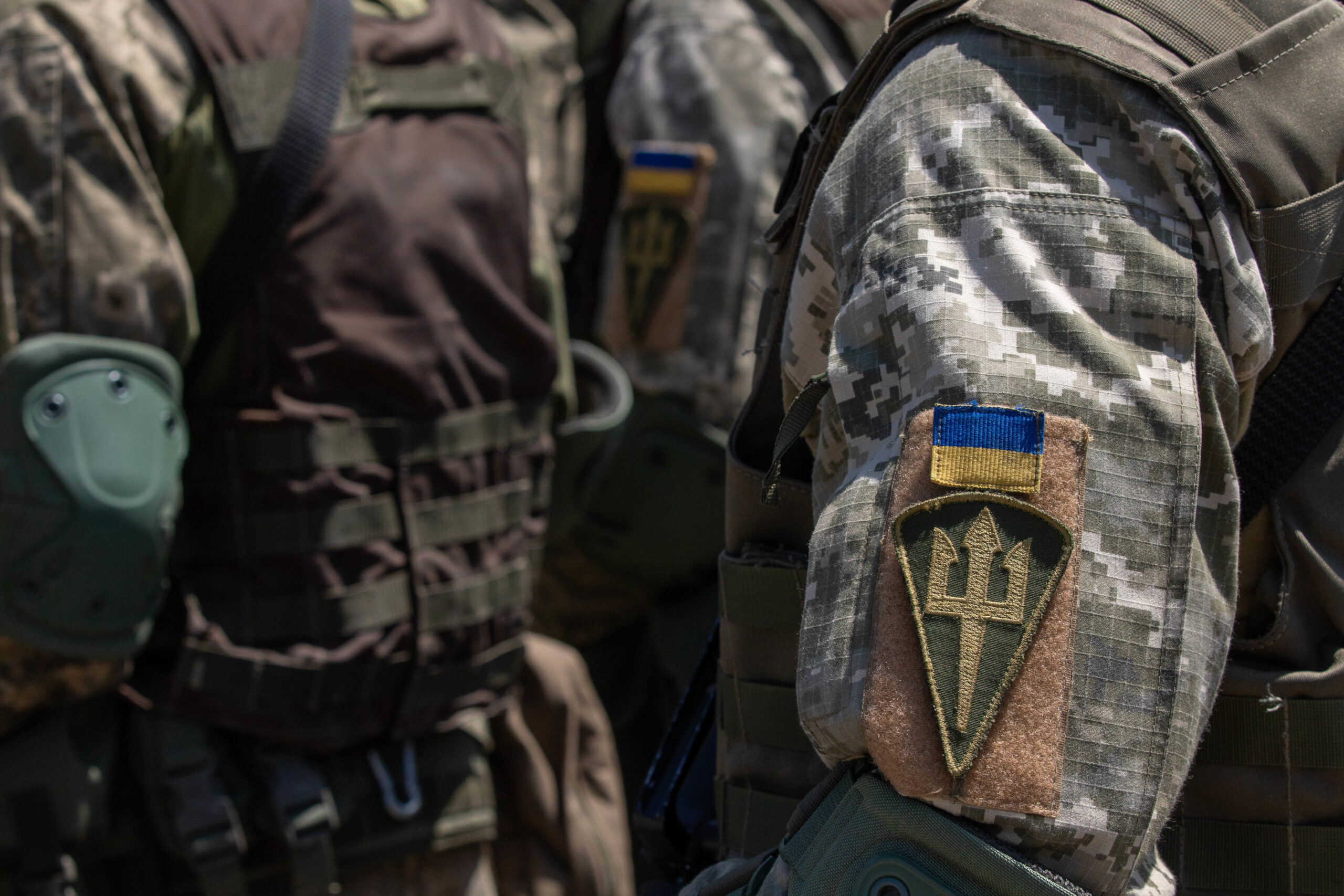 Ukrainian soldiers stand in formation during the closing ceremony of Agile Spirit 19 at Orpholo Training Area, Georgia, Aug. 9, 2019. AgS19 is a joint, multinational exercise co-led by the Georgian Defense Forces and U.S. Army Europe. Approximately 3,300 military personnel from 14 ally and partner nations participated in this theater security cooperation exercise. The brigade-level exercise incorporated a command-post exercise, field-training exercise and live fires. AgS19 occurred at three training locations in Georgia - Senaki Air Base, Vaziani and Orpholo Training Areas. (U.S. Army photo by Pfc. Laurie Ellen Schubert, 5th Mobile Public Affairs Detachment)