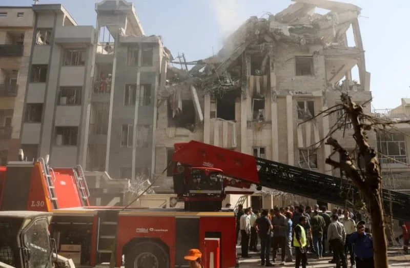 Smoke rises from a damaged building in the aftermath of Israeli strikes, in Tehran, Iran, June 13, 2025 (credit: MAJID ASGARIPOUR/WANA (WEST ASIA NEWS AGENCY) VIA REUTERS)