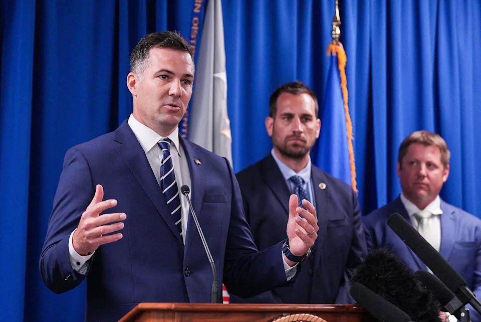 DOJ U.S. Attorney Kyle Bumgarner of the Western District of Kentucky speaks about federal grand jury returning four indictments and charging 22 defendants with drug trafficking, firearms and money laundering offenses during a press conference Tuesday morning in Louisville, Kentucky. July 1, 2025
