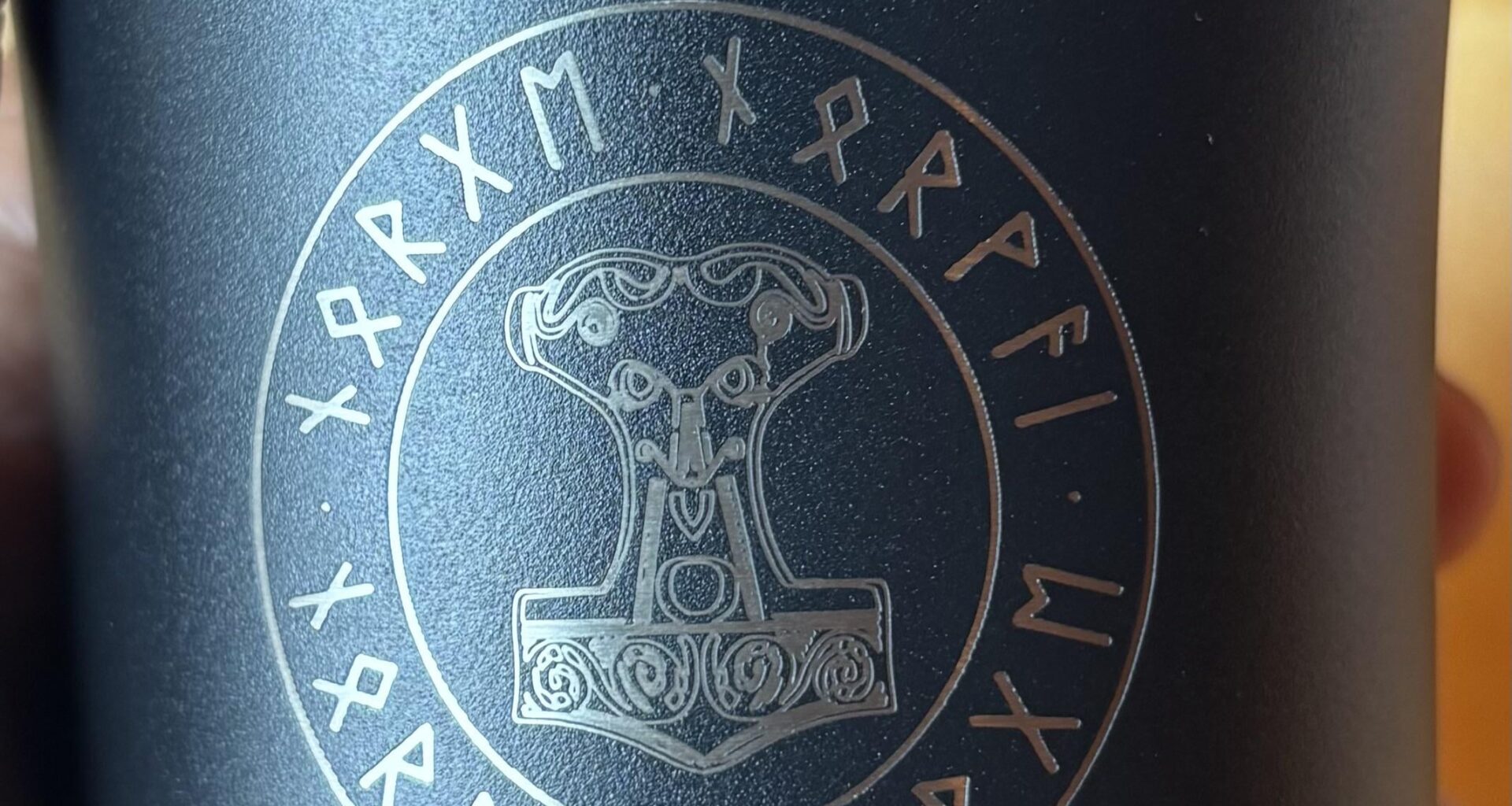 Can anyone translate these runes?